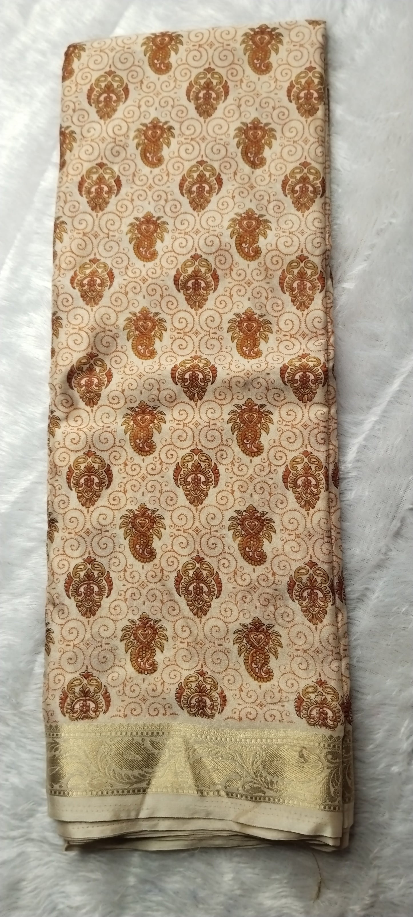 Fabric with a pattern of elephants on a beige background