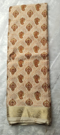 Fabric with a pattern of elephants on a beige background