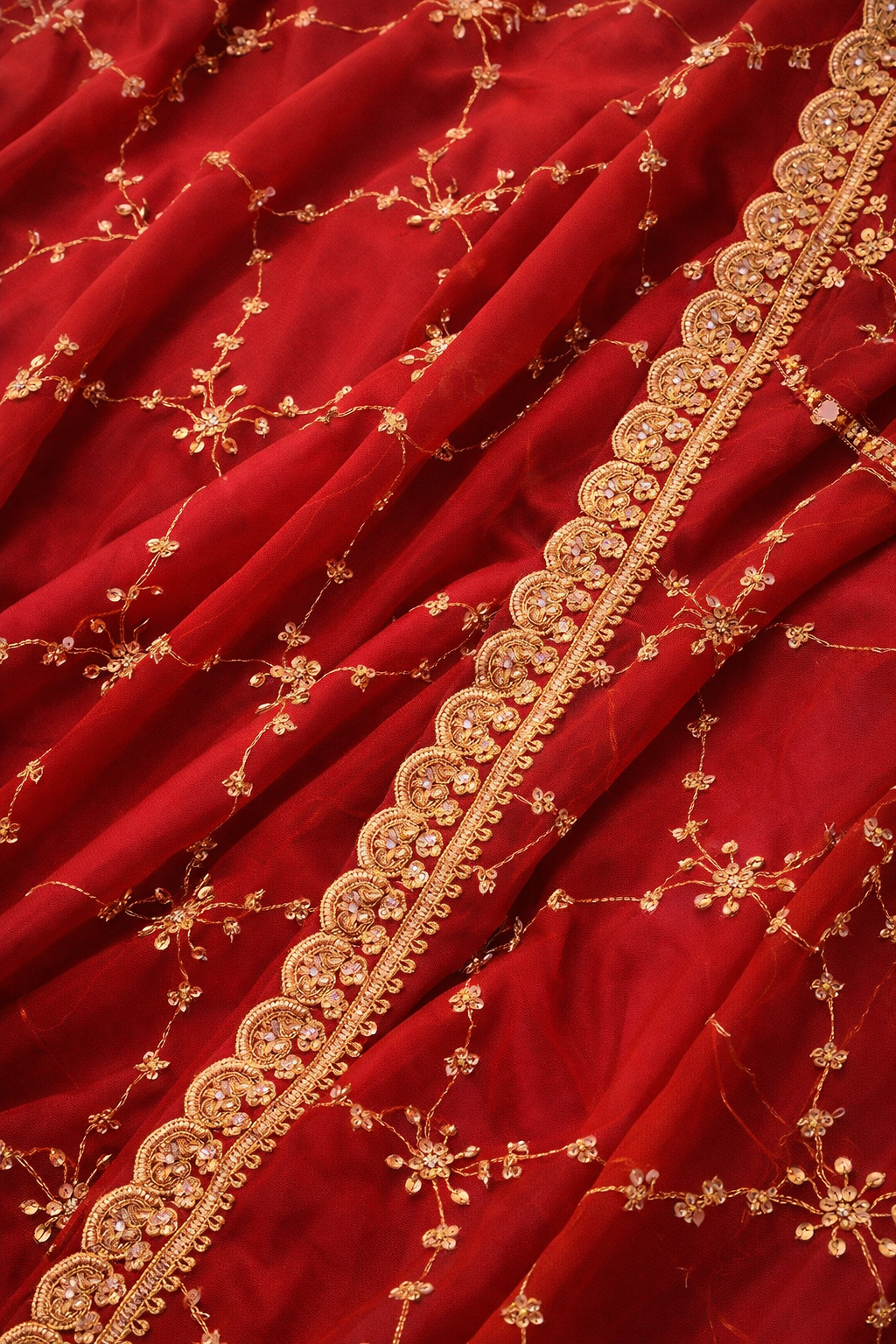 Tomato red colour gown and dupatta.